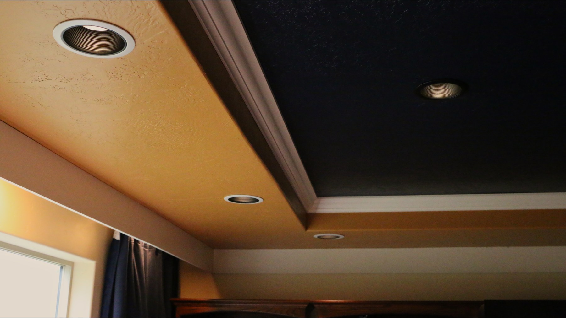 Trey ceiling detail showing the two-tone ceiling finish and trim